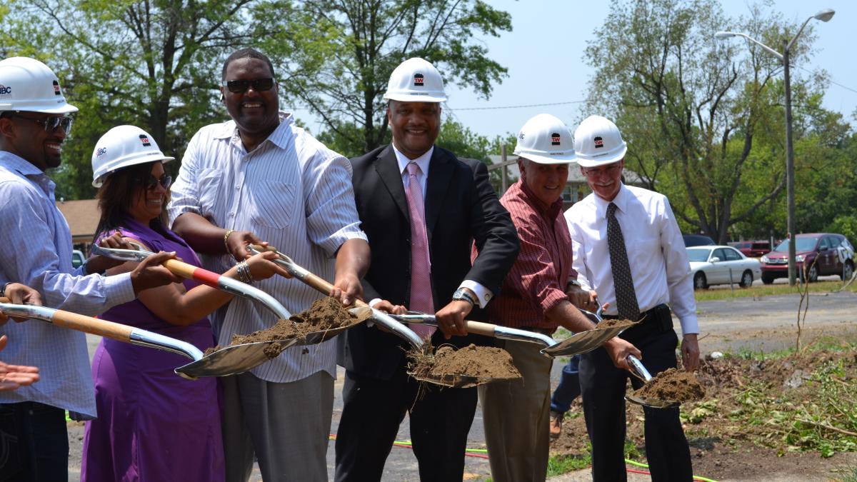 Attending a groundbreaking in 2012 
